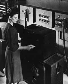 Bilas at ENIAC's punch-card reader, c. 1946. U.S. Army photograph, public domain.