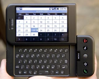 The T-Mobile G1 (2008) — the first Android phone. The year of the Linux desktop arrived in people's pockets.