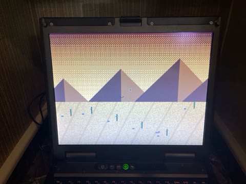 desert_mountain rendered live — the buzzard mid-flight over the dunes, on the B300's sunlight-readable display. Photograph by Rocky L. Oliver.