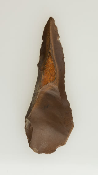 A retouched Levallois point — the refined stone-tool technology our ancestors carried across the world for hundreds of thousands of years before the Neolithic (Metropolitan Museum of Art, CC0).