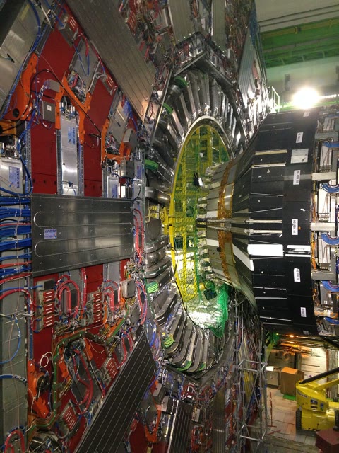 Inside the CMS detector at CERN — a five-storey, 14,000-tonne camera that photographs proton collisions 40 million times a second. The 2012 Higgs discovery was made here (Tighef, CC BY-SA 3.0).