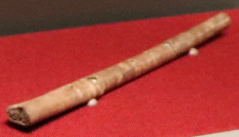 A bone flute from Jiahu, China (~7,000 BCE) — one of the oldest playable instruments known, drilled to a working scale (Furius, CC0).