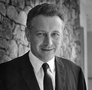 Rolf Landauer at IBM — "information is physical" was his slogan, and his 1961 paper proved it by pricing erasure (AIP Emilio Segrè Visual Archives, with permission).