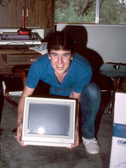 A young Terry Davis with a CRT monitor — the era that formed him. Public domain.