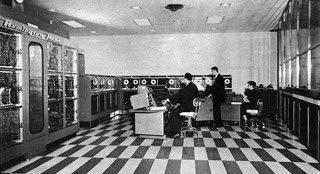 A UNIVAC I installation, photographed for the U.S. Army Ballistic Research Laboratories' 1961 survey of domestic computing systems. Public domain.